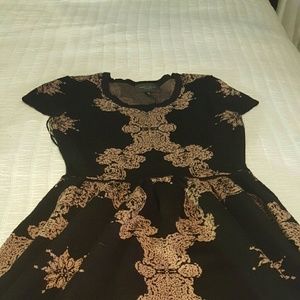 Black and gold sweater dress.