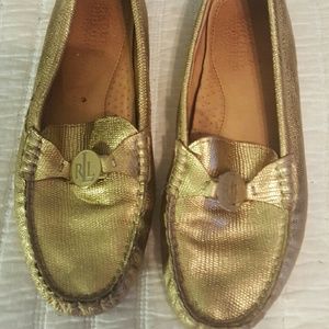 Gold riding loafers.