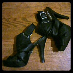 Slightly worn black heels