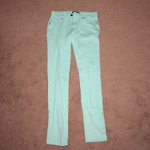 Mint green jeggings.