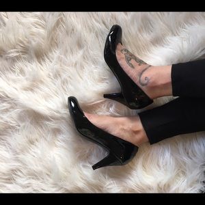 Black patent leather almond toe heels