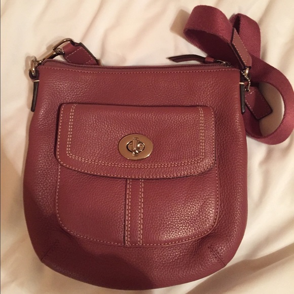 Pink leather coach crossbody bag