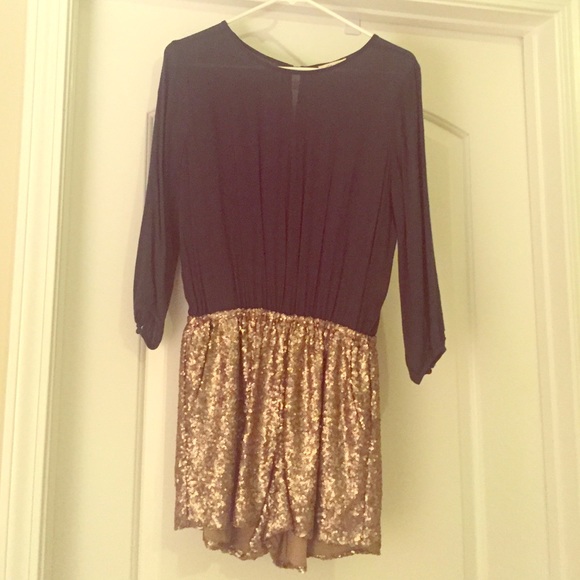 Dark green & gold short romper.