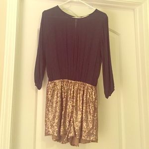 Dark green & gold short romper.