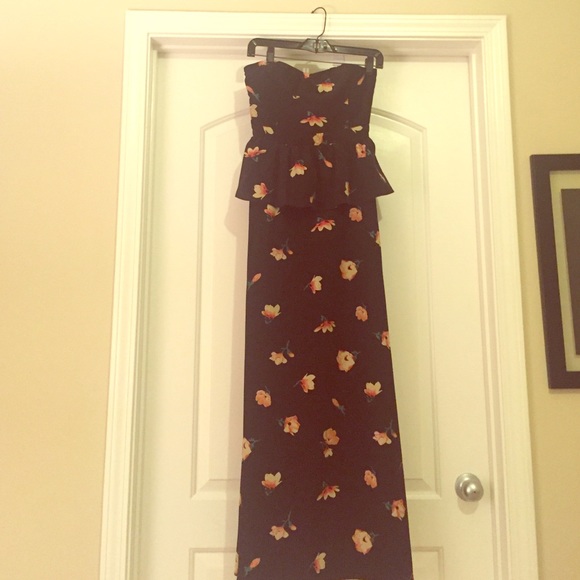 Floral peplum floor length dress.