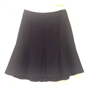 Mid waist, a-line skirt.