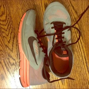 Nike Free run Grey and coral running shoes.