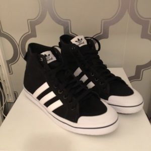 Size 10 Black honey mids from adidas.