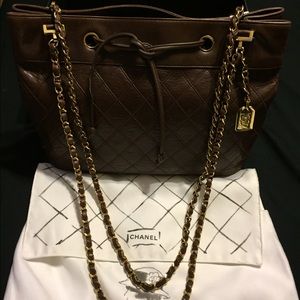 Vintage Chanel shoulder brown bag w/ gold Chain.