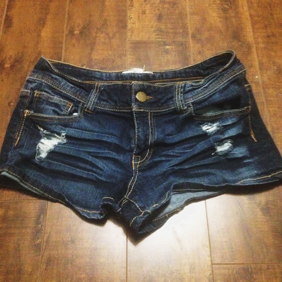 SOLD Distressed dark wash jean shorts