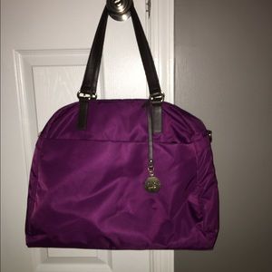 Lo & Sons OG bag. Plum colored with gold hardware.