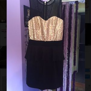 Black and gold sequin dress