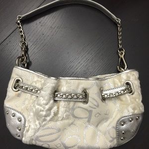Bebe Brand Silver clutch with shoulder strap