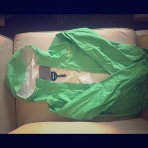 Green Patagonia rain jacket