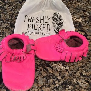 Freshly picked toddler shoes in hot pink
