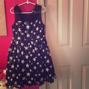 Black sequin dress with white stars