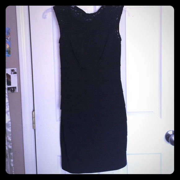 Fitted black sleeveless dress