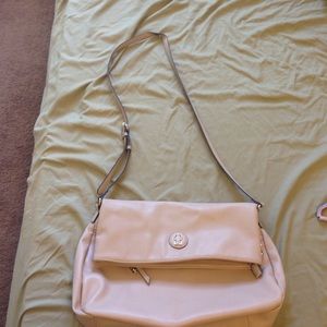 Tan purse with gold chain accent