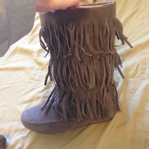 Faux moccasin boots.