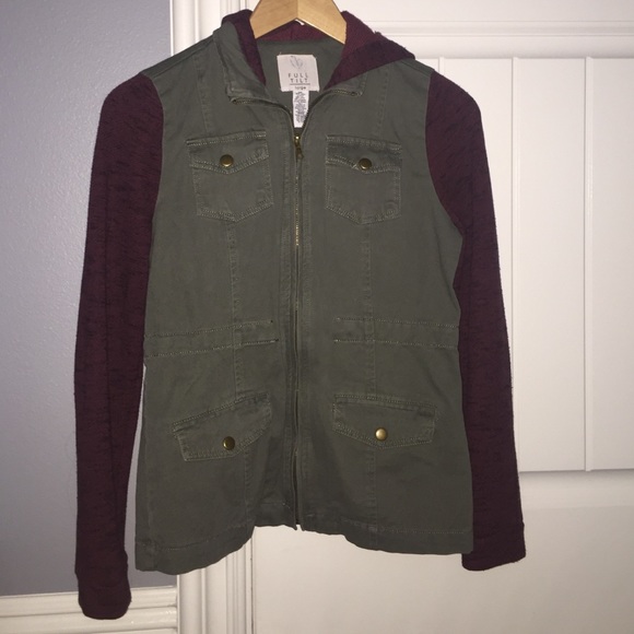 Army green utility jacket w/ red sleeves and hood.