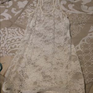 Sheer floral, imitation lace tank top.