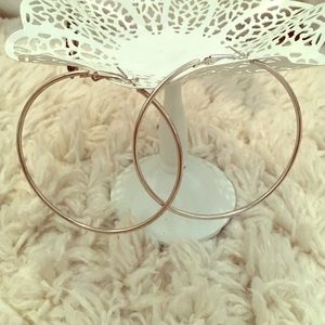 Big silver hoop earrings
