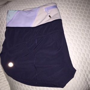 Lululemon navy shorts with multi color band