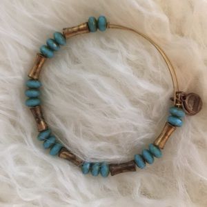 Alex and Ani- Blue and gold vintage bead.