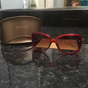 New NEVER USED Authentic red Gucci Sunglasses.