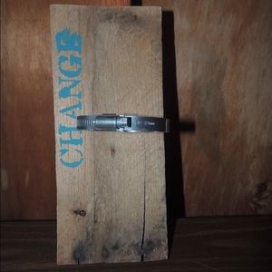 "Change" mason jar on wood