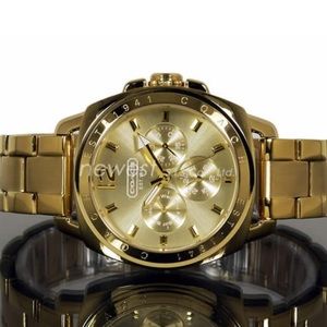 AuthenticCoach gold stainlesssteel oversized watch
