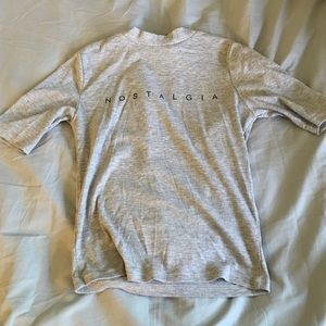 High necked NOSTALGIA tee.