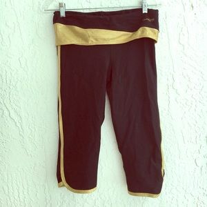 Bebe sport capris gold & black Small