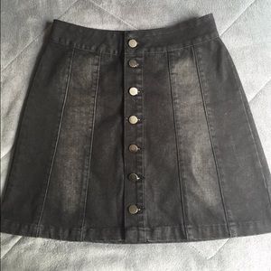 Button up denim skirt.