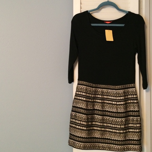 3/4 sleeve black dress with gold embroidered skirt