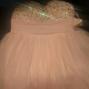 Pale pink formal dress.