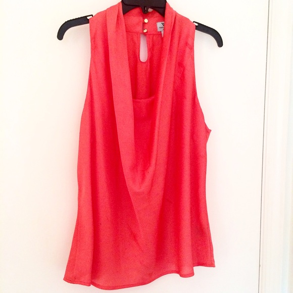 Peachy coral sleeveless top.