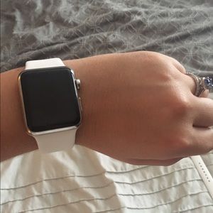 Brand new white 38mm Apple Watch sports band.