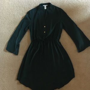 A dark teal/ green dress