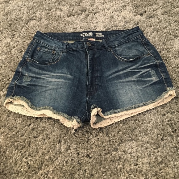 High waisted jean shorts with lace detail on leg