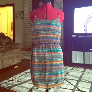 Tribal print knee length dress with tassled belt