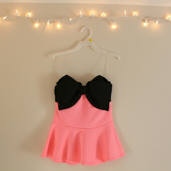 Pink sleeveless bow blouse