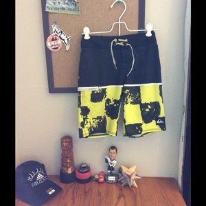 Black and yellow quiksilver swim trunks