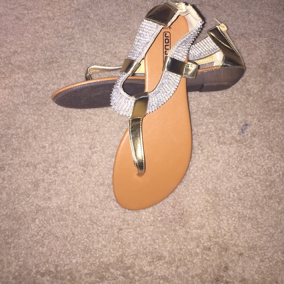 Studded gladiator sandals never worn.