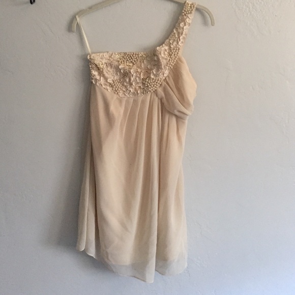 One shoulder cream colored dress