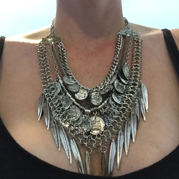 Boho coin and feather necklace.