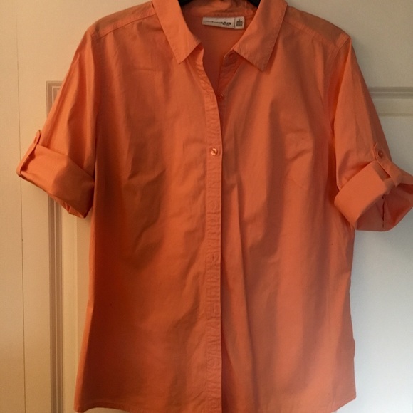 A short sleeve button up collar shirt. - Picture 1 of 1