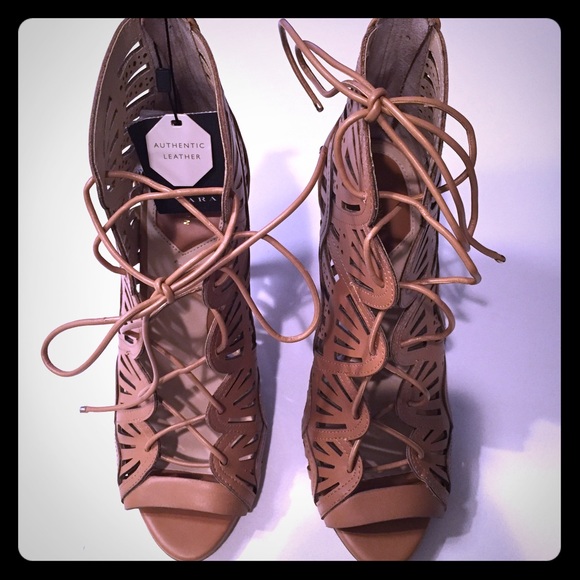 Brand New Zara Tan lace up sandals.