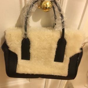 J crew shearling satchel.