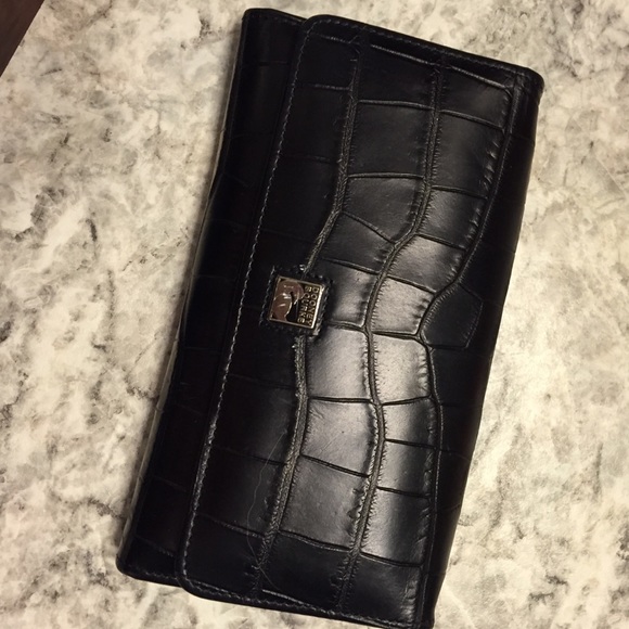 Classic lightly used Dooney Bourke trifold wallet